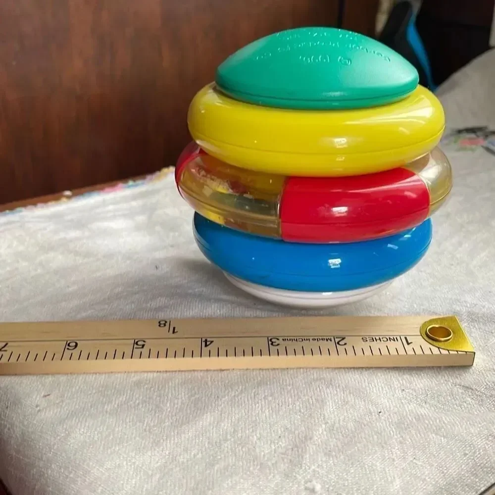 1996, Ring ‘n Roll Gerber Products Co. Toy Biz, Inc roundish rolling rattle infa